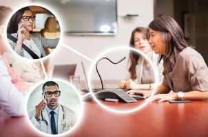 People around a conference table; two persons are connected remotely (shown in circles)